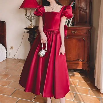 A winter wine red satin engagement dress with puffed short sleeves and a square neckline