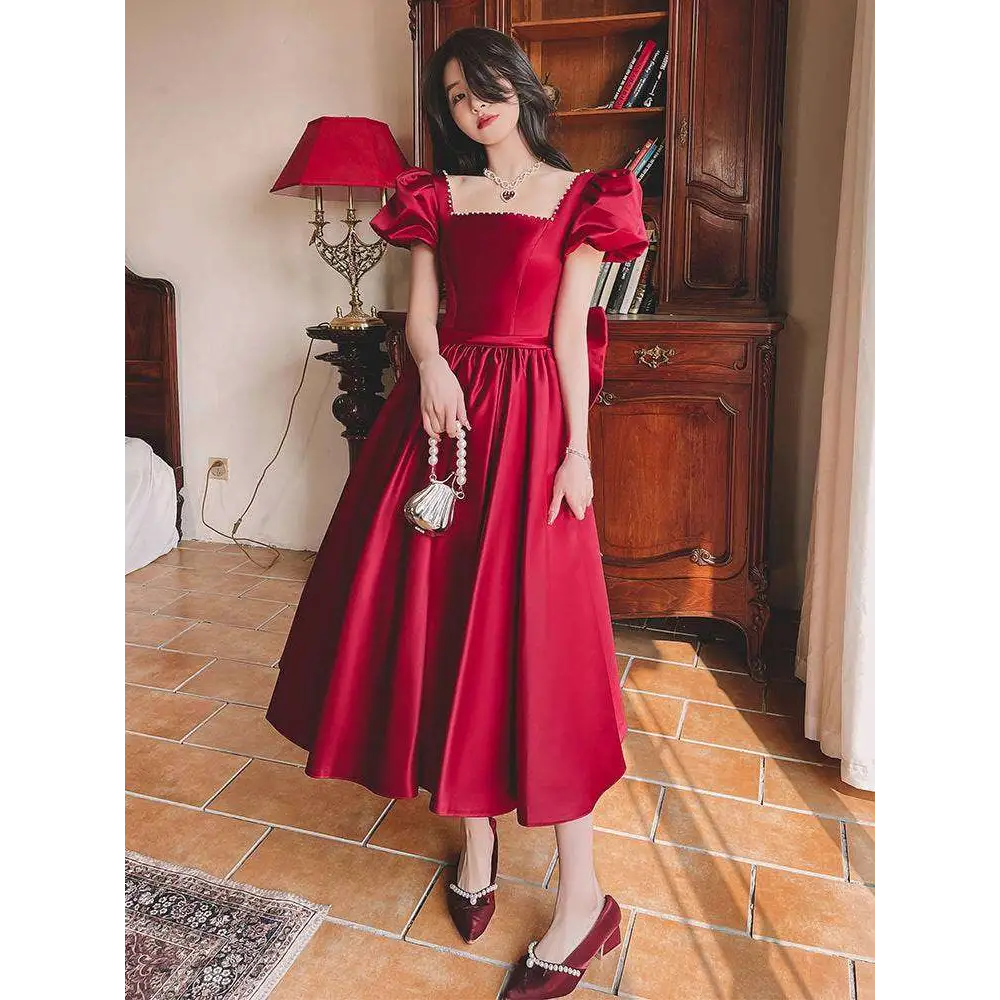 Winter wine red satin engagement dress with puffed short sleeves and a square neckline midi style