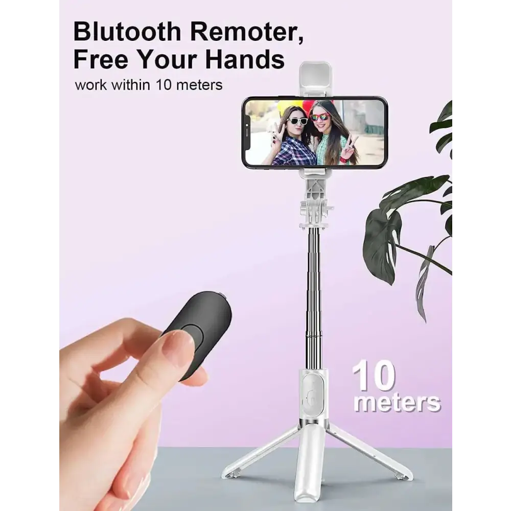 White wireless bluetooth selfie stick tripod with extendable pole and led light holding an iphone for photo-taking