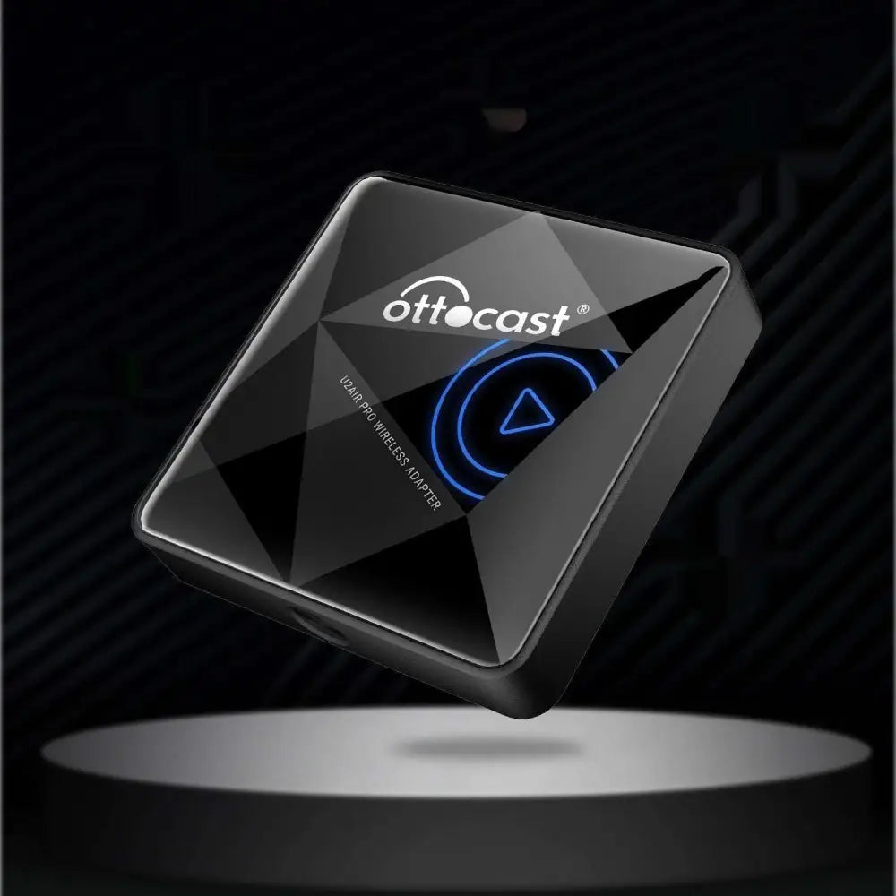 Black matte-finish ottocast u240 pro wireless car bluetooth adapter with faceted design and glowing blue play button