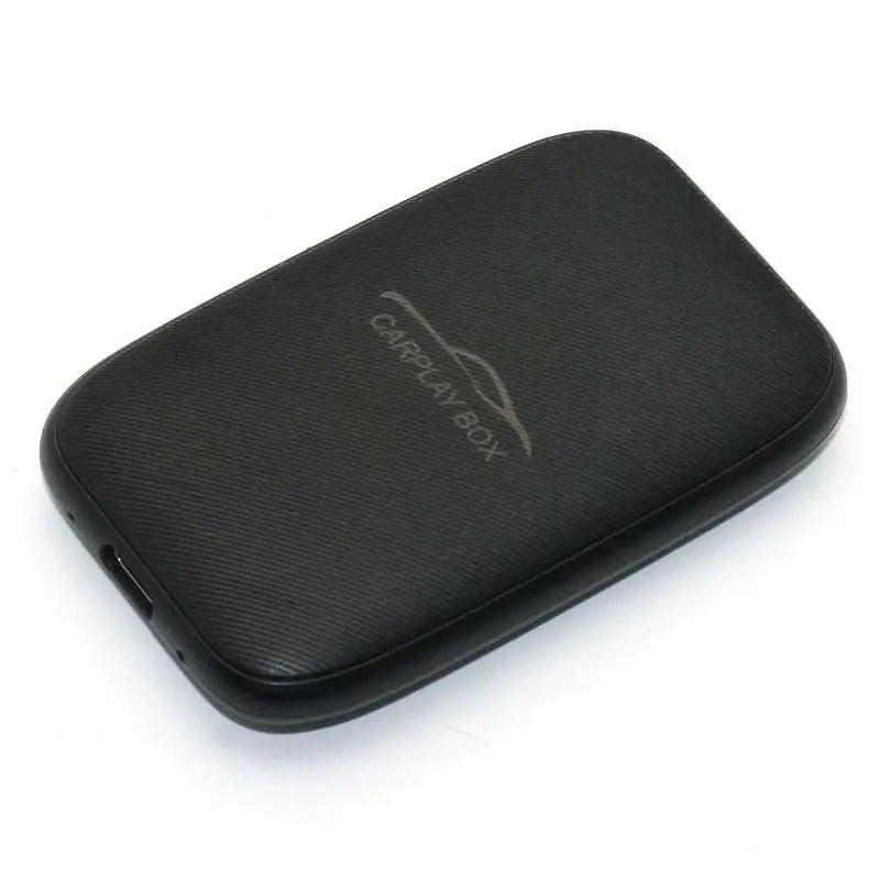 Black textured rectangular wireless carplay box with subtle silver logo for original car integration closed system