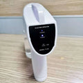 White plastic wireless electric sprayer disinfection gun with black control panel and clear liquid reservoir capacity