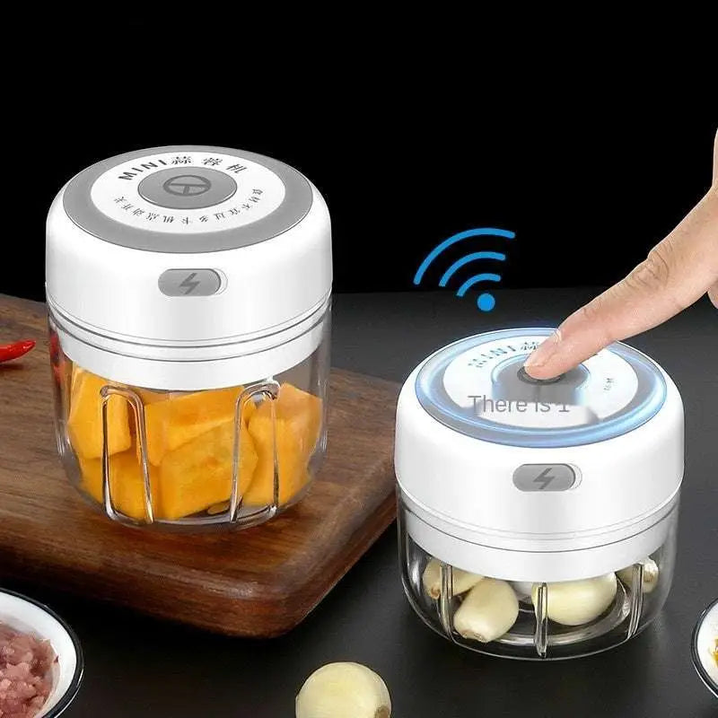 White wireless mini baby electric chopper with clear glass container and silver accents for baby food supplement use