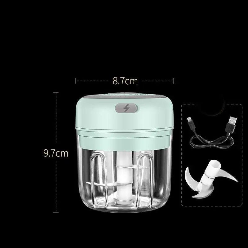 Wireless mini baby food supplement electric chopper in compact mint green clear plastic with white blade assembly