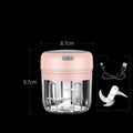 Wireless mini baby food supplement electric chopper with pink and clear plastic body and white blade assembly