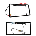 Black wireless smartphone car license plate frame with integrated american frame camera and red led lights back side view