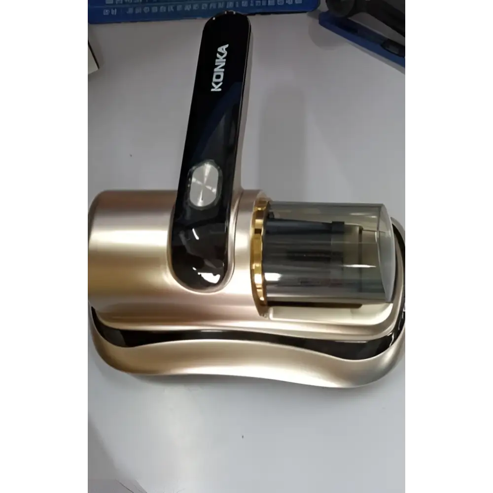 Gold-colored konka smart door handle with black grip and sleek design for wireless uv mite removal vacuum cleaner use