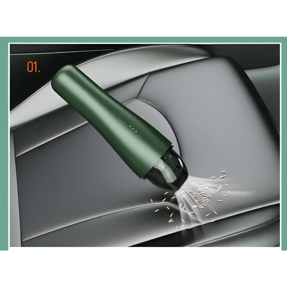 A sleek dark green wireless vacuum cleaner with transparent dust collection suctioning debris from a car seat