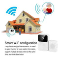 White wireless video doorbell with black camera lens and circular button paired with 9e9e9e chime speaker featuring modern design