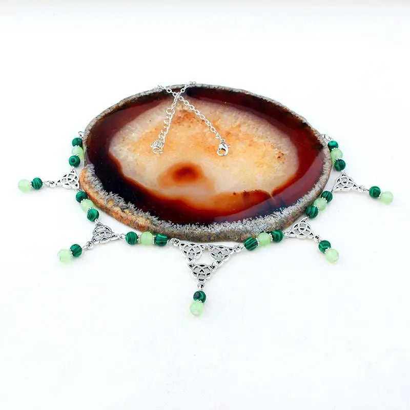 Silver celtic witchcraft irish knot pagan headpiece with intricate knotwork and alternating dark and light green beads