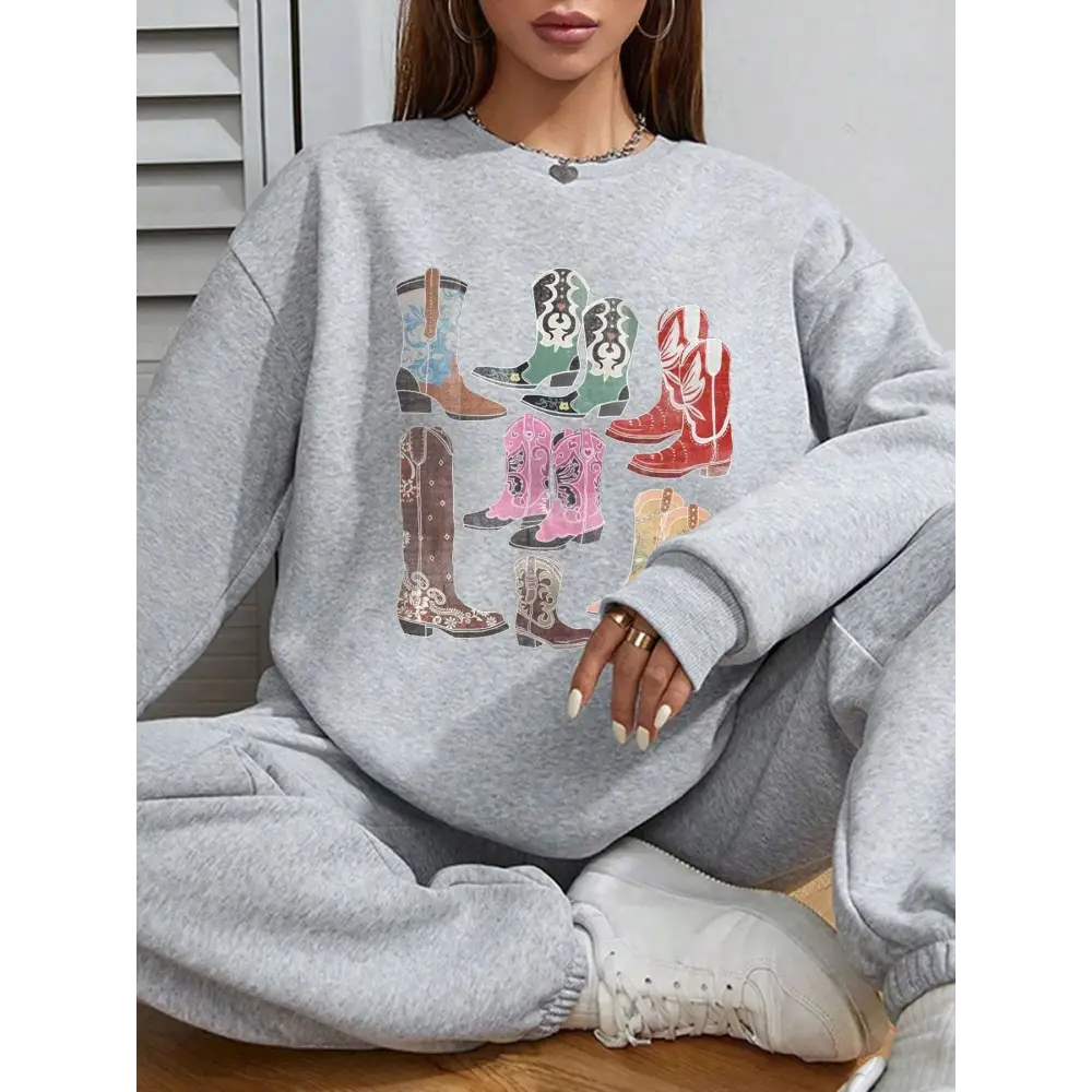 Gray oversized round neck pullover featuring colorful women cowboy boots print in various patterns and hues