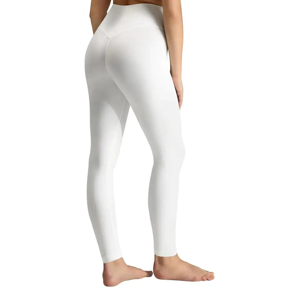 Women high waisted white tummy control yoga pants with smooth form fitting design for active wear