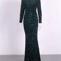 Emerald green modest stretch sequin mermaid gown with long sleeves and a fitted silhouette for evening wear