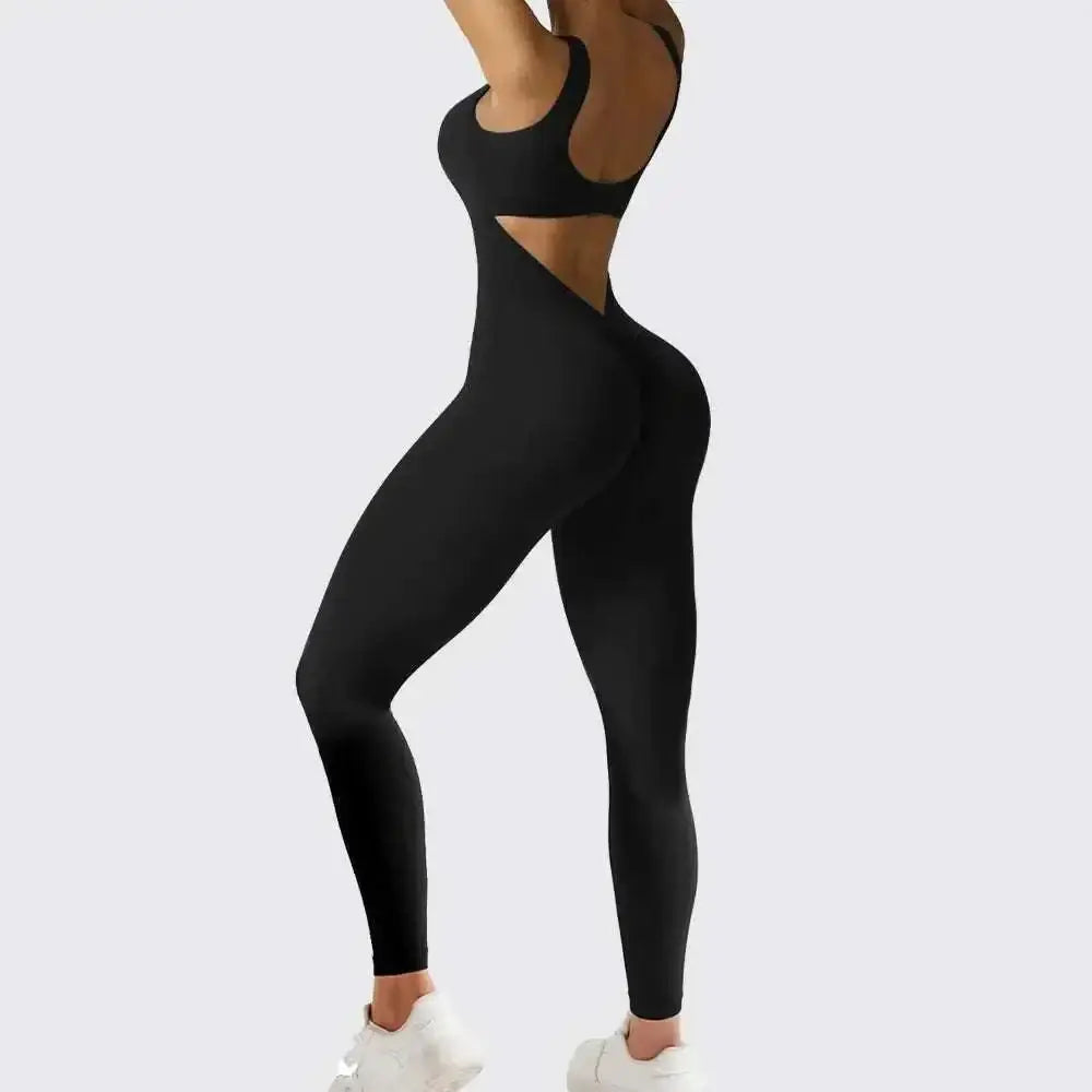 Back view of black sleeveless flare jumpsuit with cutout details designed for flare fitness yoga and high-waisted leggings