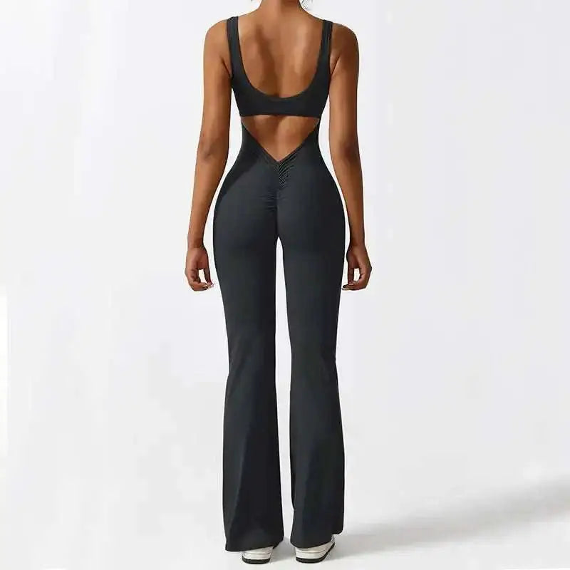 Black sleeveless flare jumpsuit with back cutout and flared legs for flare fitness yoga and high-waisted flared leggings look