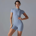 A sleek light blue shorts jumpsuit yoga bodysuit with short sleeves high collar and zipper designed front closure