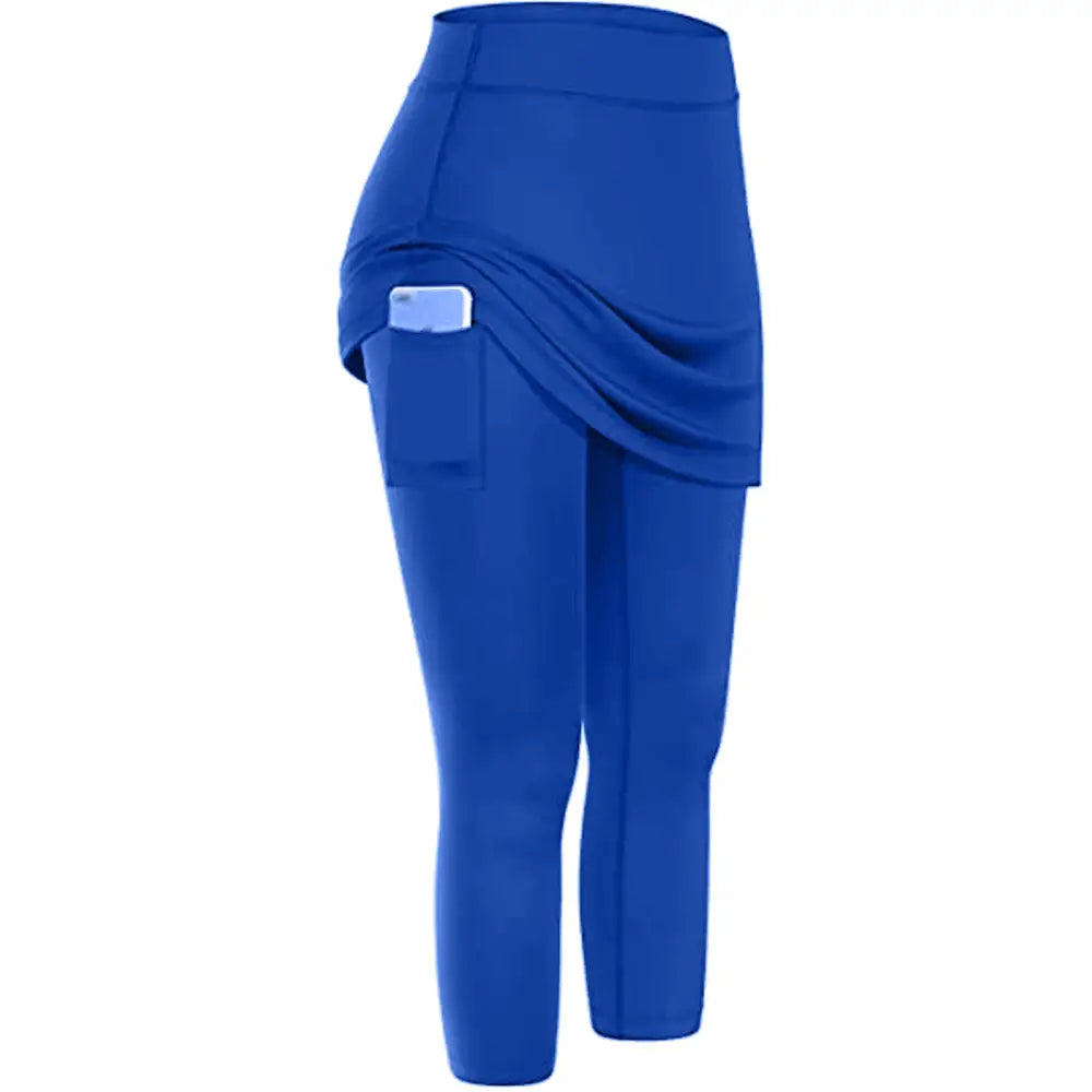 Royal blue women tennis skirted leggings with draped skirt overlay and built-in phone pocket for active use