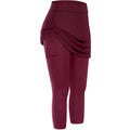 Women tennis skirted maroon athletic leggings with draped skirt overlay and skirted leggings pockets for active use