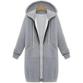 Women zip up long thick hooded winter sweater in gray with contrasting black zipper and white drawstrings for cold weather
