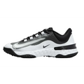 Womens alpha huarache elite 4 softball turf shoes in white and black with textured upper and silver swoosh detailing