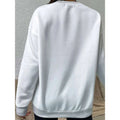 White oversized crewneck sweatshirt with soft plush fabric and ribbed cuffs featuring blue lips graphic long sleeve sweatshirt