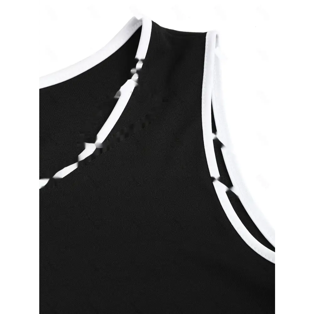 Black sleeveless top with white trim paired with women’s matching blazer and hip skirt set for formal wear