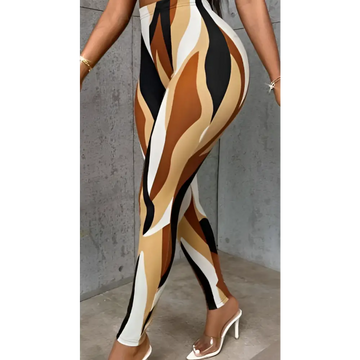 Women’s colourblock printed slim fit leggings featuring tight-fitting fabric with bold black white and tan abstract stripes