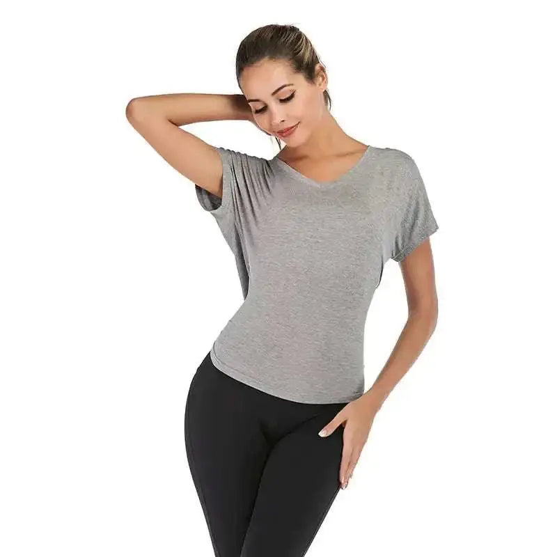 Women’s heather gray v-neck sports t-shirt with short sleeves and relaxed fit made of soft fabric