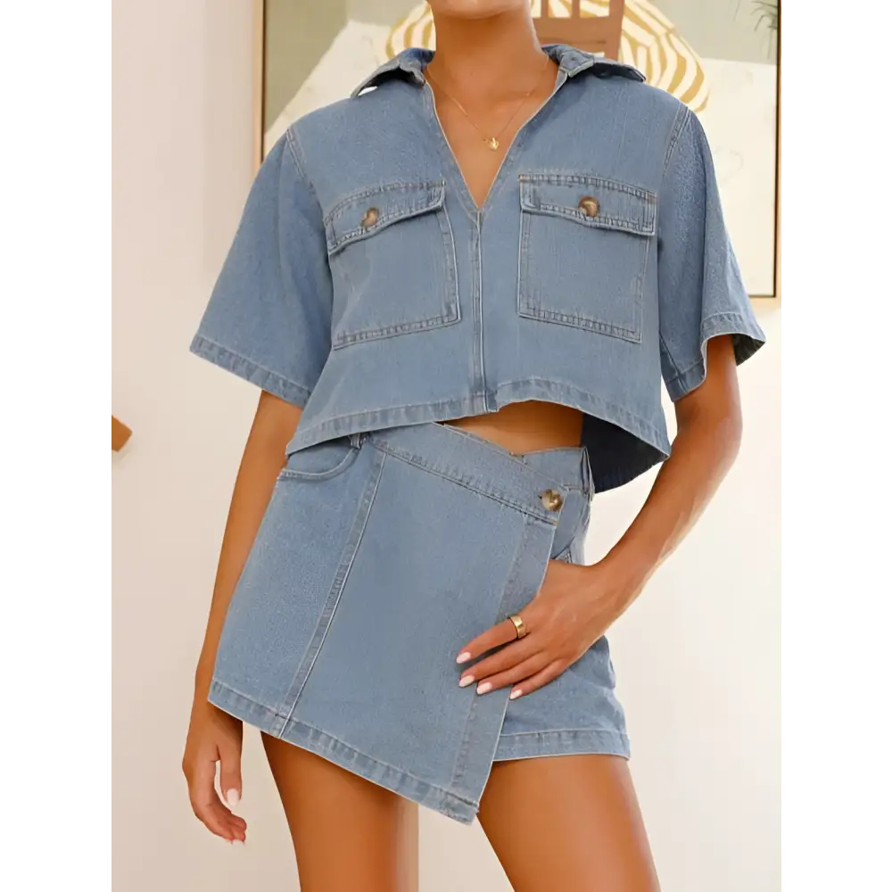 Women’s irregular denim short pantskirt suit featuring a light-wash cropped shirt and asymmetrical mini skirt