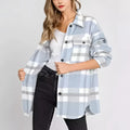 Women’s plaid buckle long sleeve jacket in light blue and white plaid flannel with black buttons