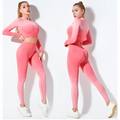 Women’s seamless gradient long sleeve yoga set in pink featuring a crop top and matching leggings seamless fabric