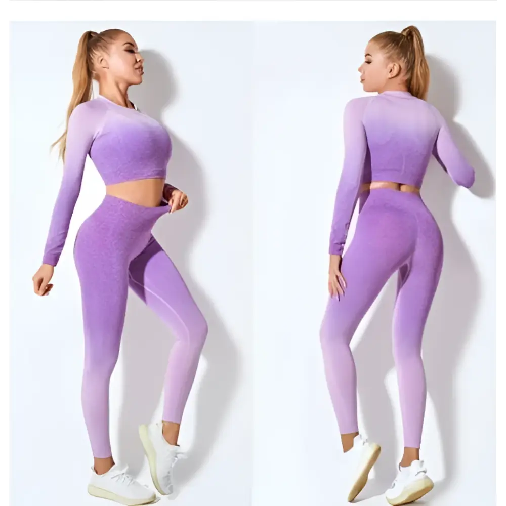 Women’s seamless gradient long sleeve yoga set in purple featuring a crop top and leggings made of stretchy fabric