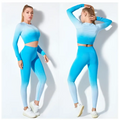 A vibrant blue seamless gradient long sleeve yoga set featuring a crop top and matching leggings for women