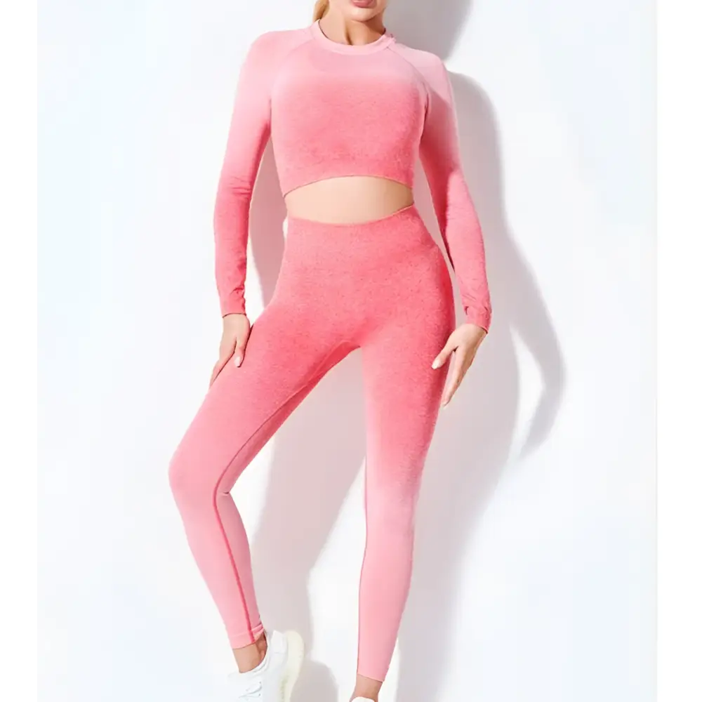 Women’s seamless gradient long sleeve yoga set featuring a pink gradient seamless long crop top and leggings