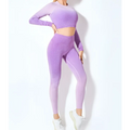 Women’s seamless gradient long sleeve yoga set in lavender featuring a stretchy crop top and leggings made from athletic fabric