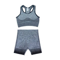 Gray and black heathered women’s seamless yoga two-piece set with ribbed detailing for hip lifting workout