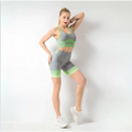 Women’s seamless yoga hip lifting workout two-piece set in vibrant lime green and gray heathered textured knit fabric