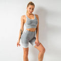 Women’s seamless yoga gray heathered two-piece set with white trim and ribbed detailing for hip lifting workout
