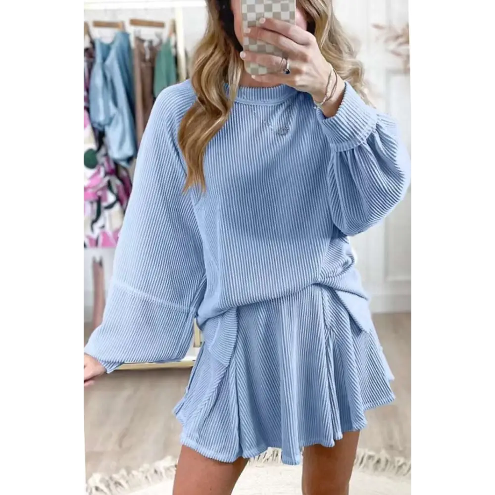Light blue women’s solid colour ribbed knit casual suit with long sleeves and flared skirt two-piece outfit