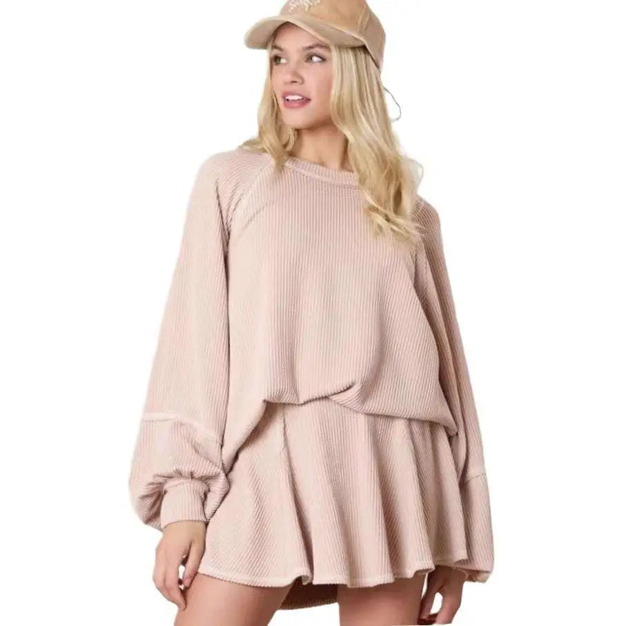 Beige ribbed knit casual suit for women featuring a two-piece solid colour loungewear set with oversized sleeves and flared skirt