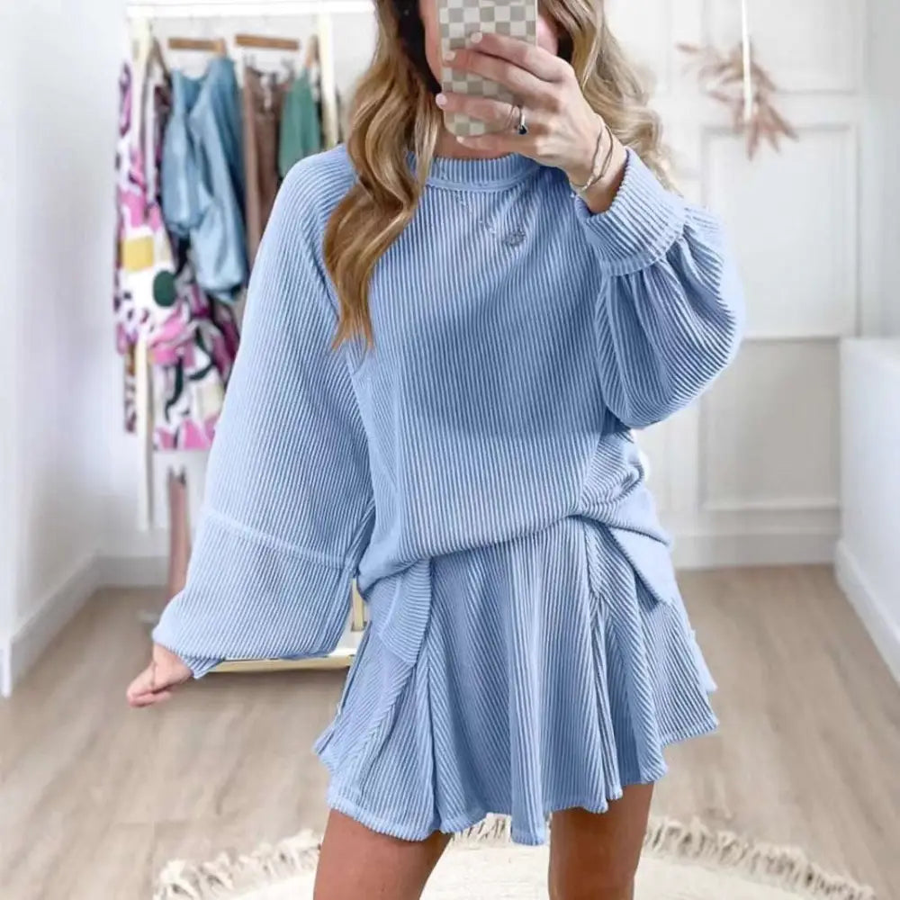 Light blue ribbed knit casual women’s solid colour two-piece suit with bell sleeves and flared skirt