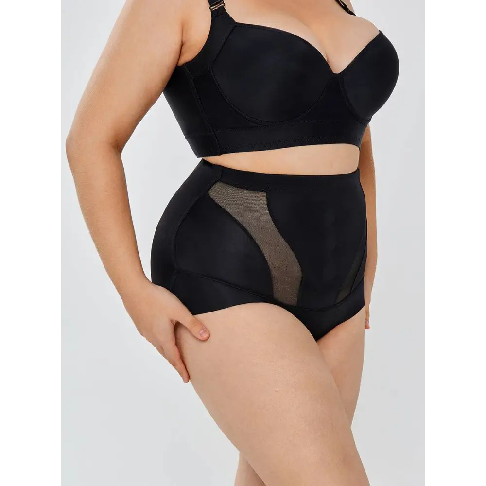 Black womens tummy control high waist mesh body shaper briefs with sheer side panel for slimming effect
