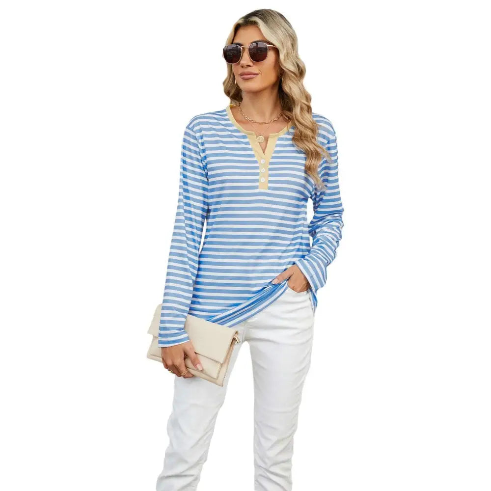 Women’s v-neck striped loose henley top in blue and white stripes with beige button placket and green collar