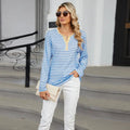 Women’s v-neck striped loose henley top in blue and white with a yellow collar and button placket