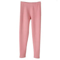 A pair of warm cashmere fleece lined thermal leggings in soft pink with stretchy fabric and elastic waistband