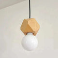 A minimalist hexagonal wood pendant light with a matte white edison glass bulb ideal for living room lighting