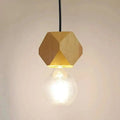 A warm-toned hexagonal wood pendant light with visible grain and edison glass bulb ideal for living room use