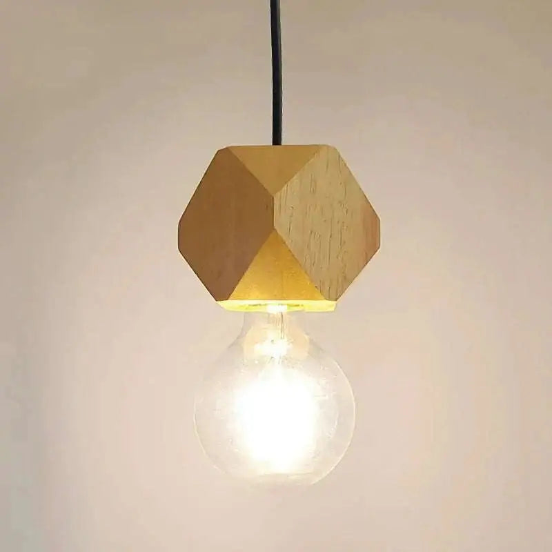 A warm-toned hexagonal wood pendant light with visible grain and edison glass bulb ideal for living room use