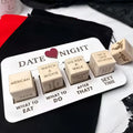 White plastic wooden date night dice game board with five wooden cubes featuring romantic date night dice ideas