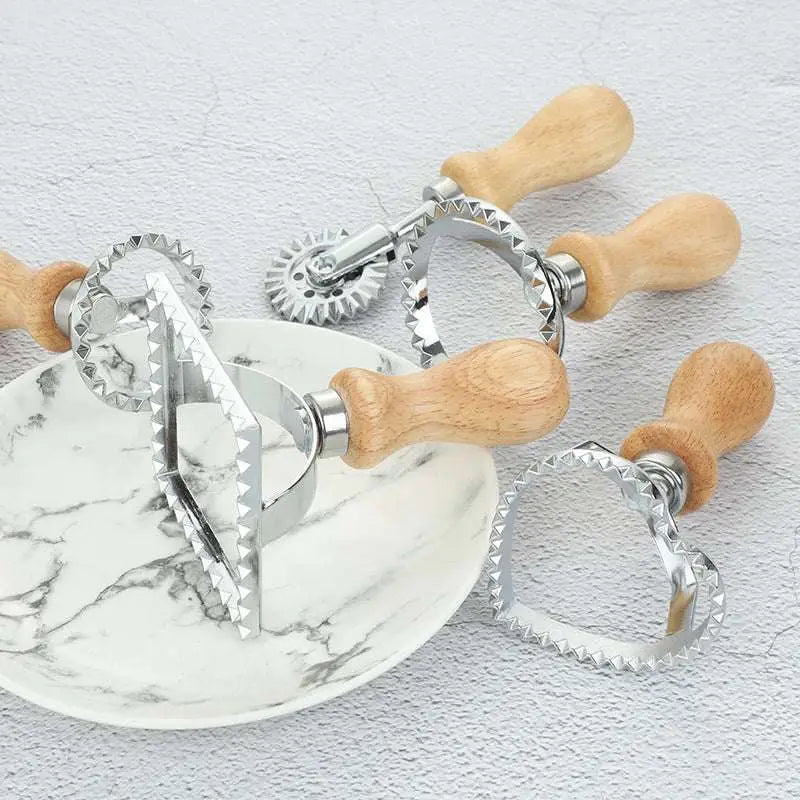 Set of four stainless steel dim sum pastry cutters with wooden gear dim handles in heart and star shapes